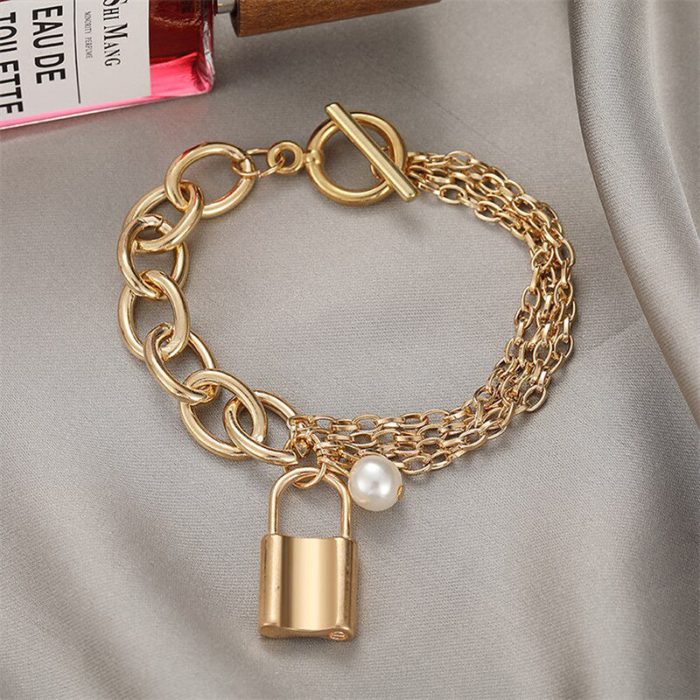 Gold-Toned Gold Plated Bracelet With A Lock - VAIRAVI