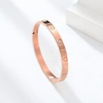 Stainless Steel Astonishing Rose Gold Plated Love AD Bracelet For Women - VAIRAVI