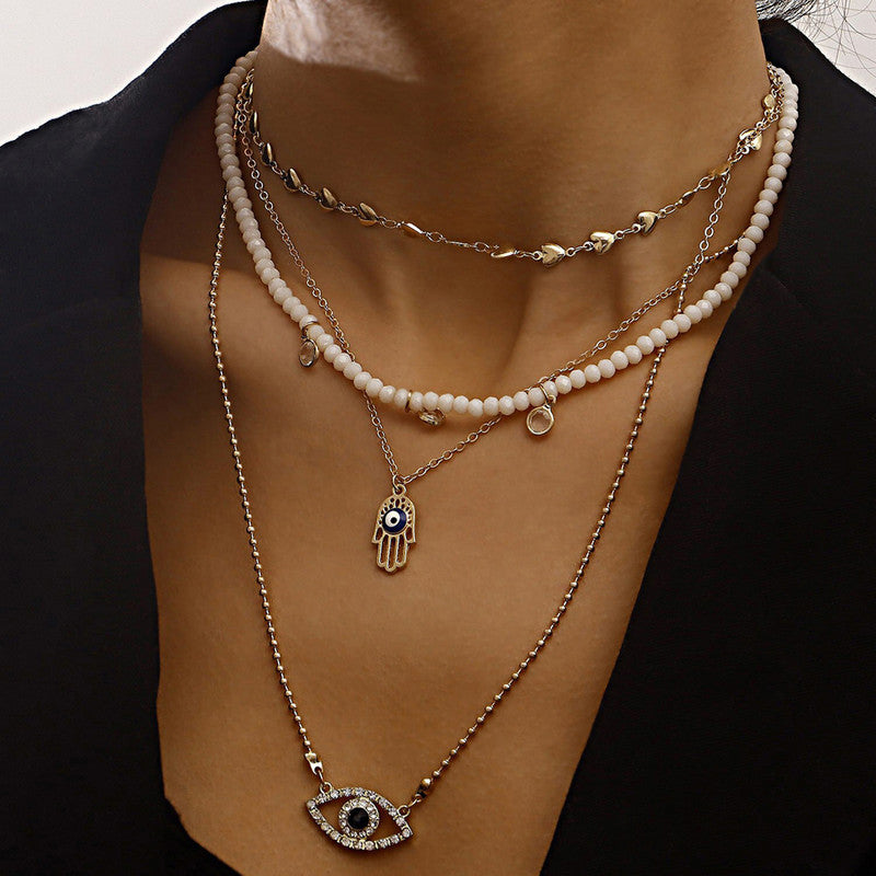 Gold Plated Gold-Toned Evil Eye and Buddha Hand Layered Necklace For Women - VAIRAVI Gold Plated Gold-Toned Evil Eye and Buddha Hand Layered Necklace For Women - VAIRAVI
