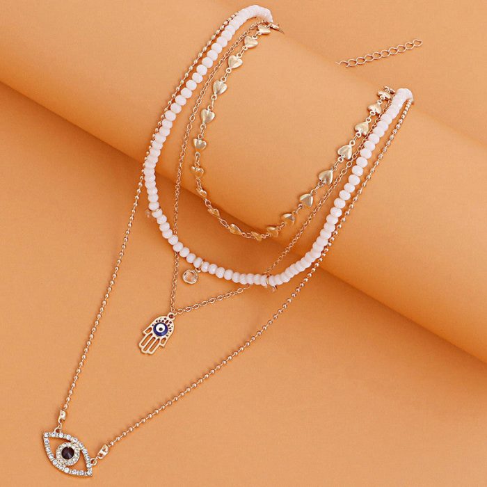 Gold Plated Gold-Toned Evil Eye and Buddha Hand Layered Necklace For Women - VAIRAVI