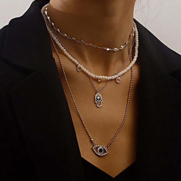Gold Plated Gold-Toned Evil Eye and Buddha Hand Layered Necklace For Women - VAIRAVI