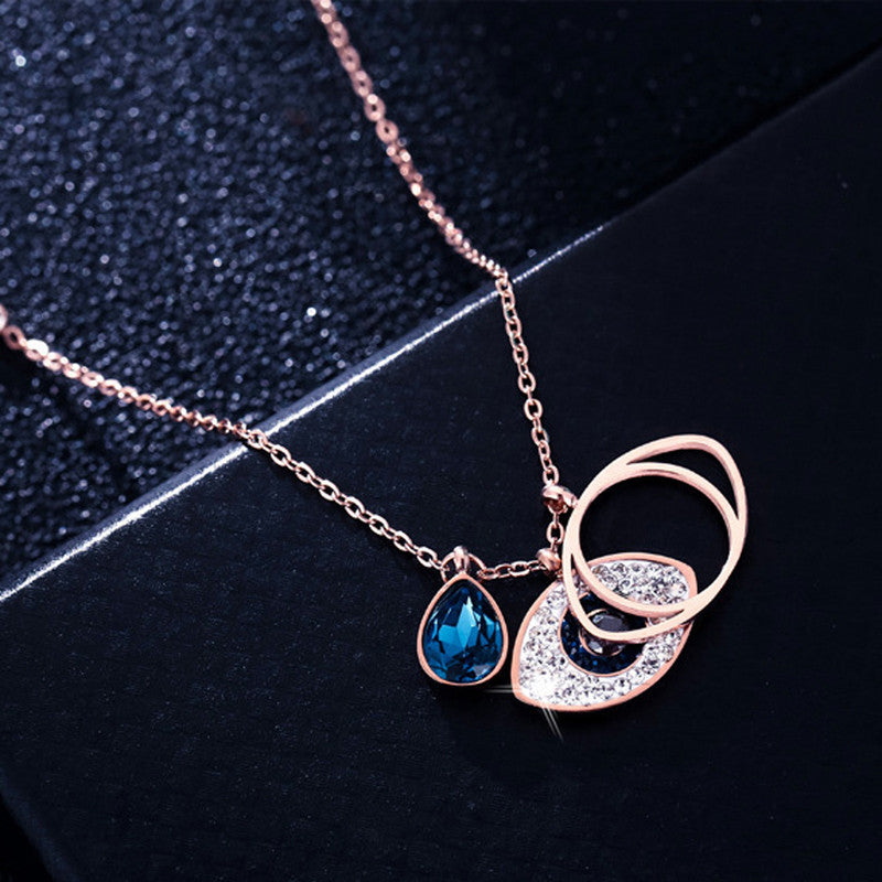 Stainless Steel Rose Gold Plated American Diamond Studded Evil Eye Pendant Necklace - VAIRAVI Stainless Steel Rose Gold Plated American Diamond Studded Evil Eye Pendant Necklace - VAIRAVI
