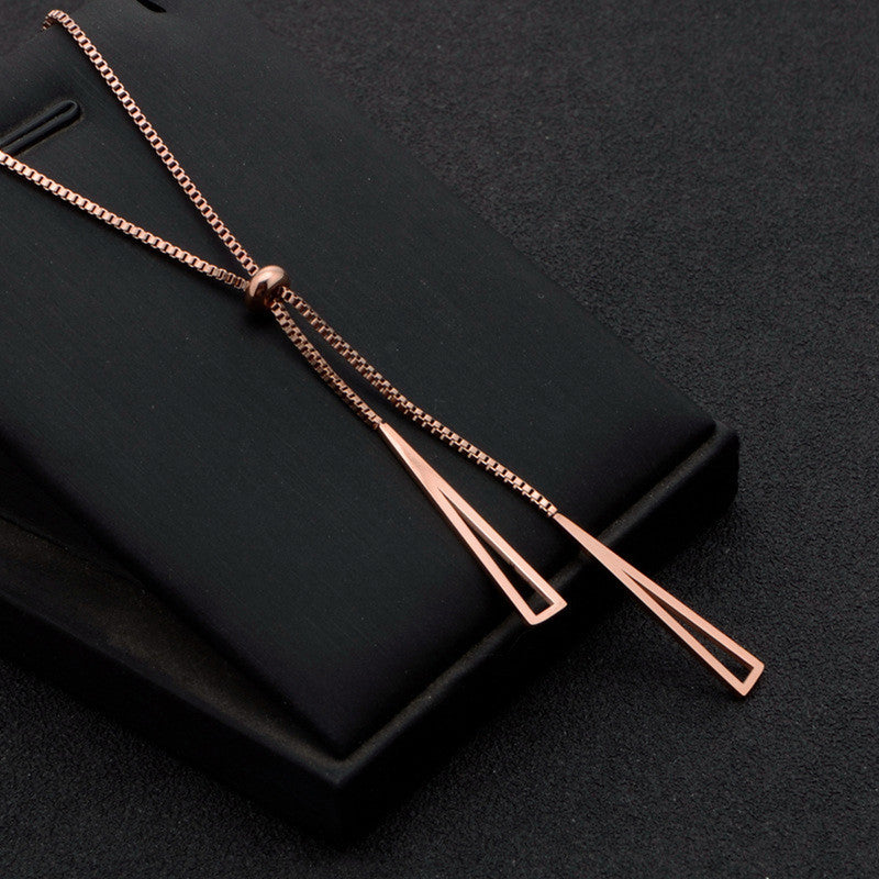 Stainless Steel Rose Gold Plated Stainless Steel Geometric Tassel Pull-Out Necklace - VAIRAVI Stainless Steel Rose Gold Plated Stainless Steel Geometric Tassel Pull-Out Necklace - VAIRAVI