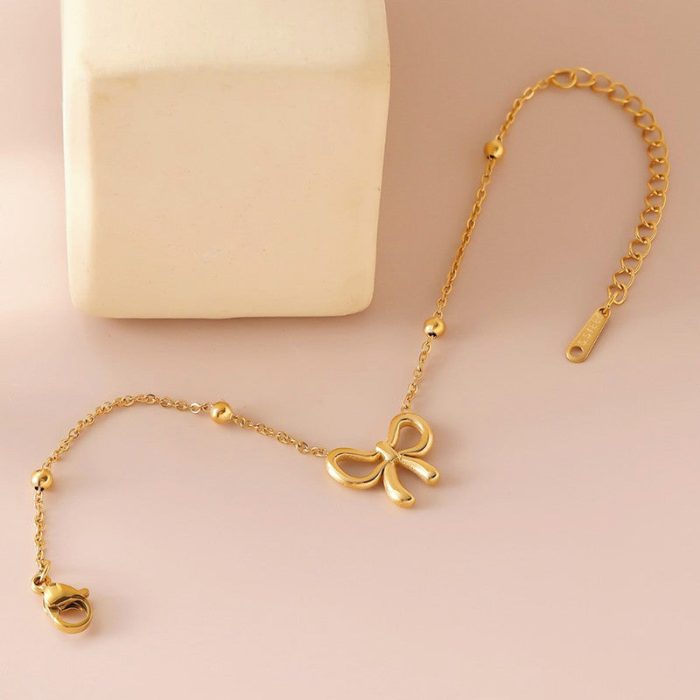 Gold Plated Anti Tarnish Stainless Steel Bow Themed Wraparound Bracelet - Image 8