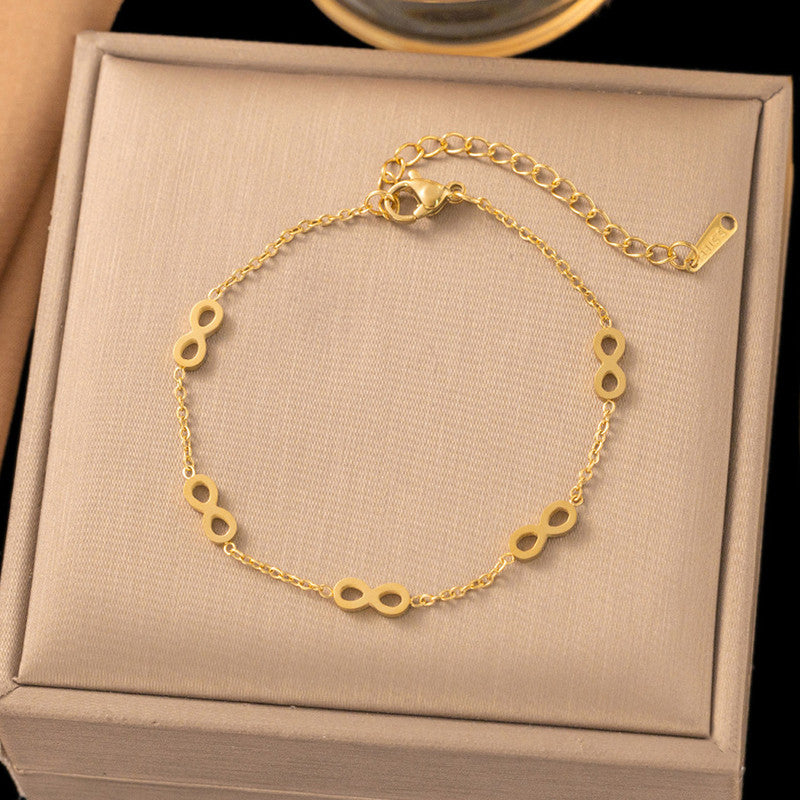 Gold Plated Infinity Themed Wraparound Bracelet - Image 1