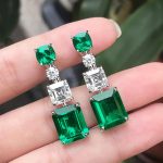 Silver Plated American Diamond Studded Green Geometrical Crushed Ice Cut Drop Earrings