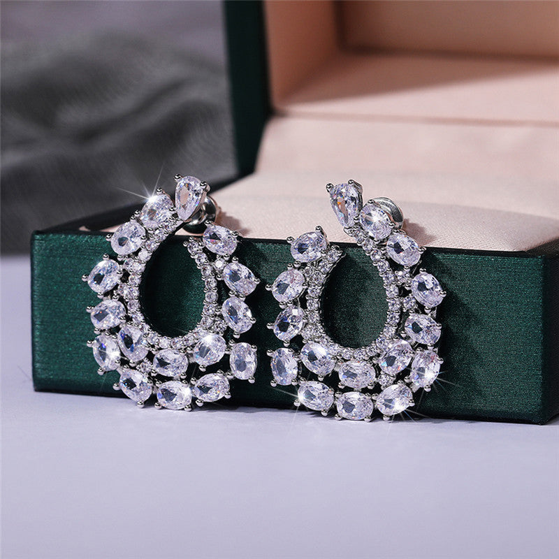 Silver Plated Anti Tarnish American Diamond Studded Contemporary Teardrop Earrings - Image 1