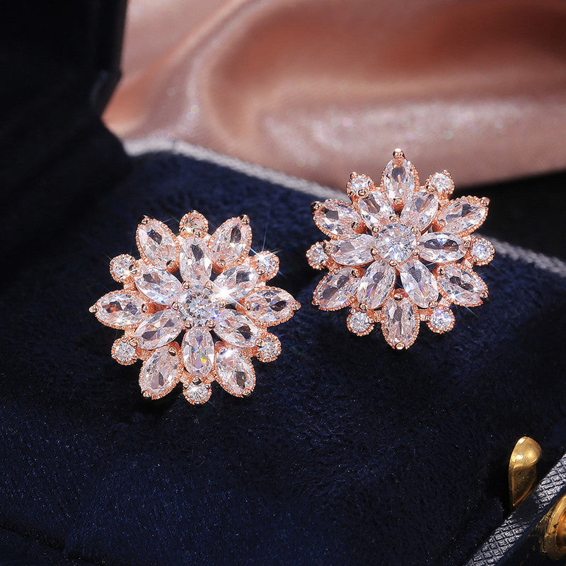Rose Gold Plated American Diamond Studded Floral Silver Stud Earrings - Image 1