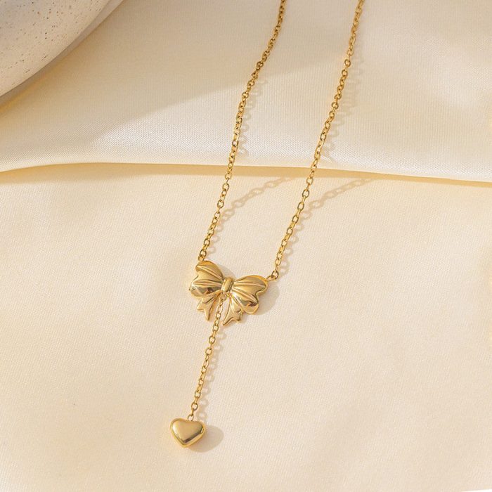 Gold Plated Stainless Steel Anti Tarnish Heart Themed Bow inspired Pendant Necklace - Image 3
