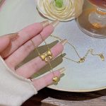 Gold Plated Stainless Steel Anti Tarnish Heart Themed Bow inspired Pendant Necklace - Image 6