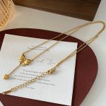 Gold Plated Stainless Steel Anti Tarnish Heart Themed Bow inspired Pendant Necklace - Image 8