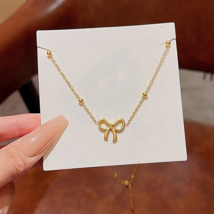 Gold-Plated Anti Tarnish Infinity Bow Pendant - Image 4