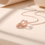 Rose Gold Plated American Diamond Studded Dual Hearts Pendant