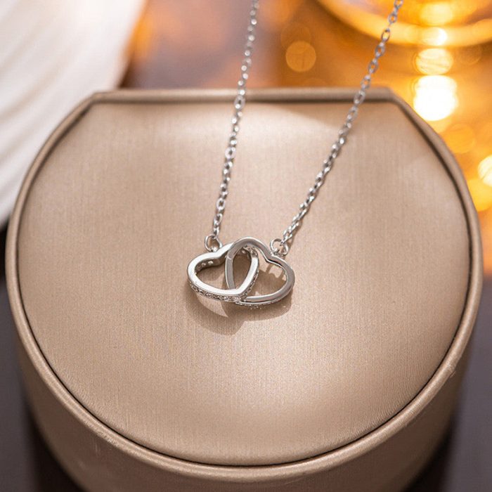 Silver Plated Anti Tarnish American Diamond Studded Dual Hearts Pendant - Image 6