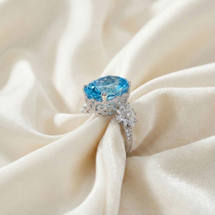 Silver Plated American Diamond Crushed Ice Cut Blue Oval Finger Ring - Image 2