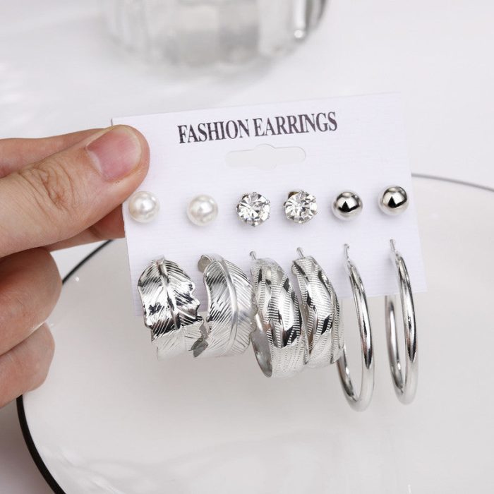 Delicate Leaf Pearl and AD Fabulous Stud and Drop Earrings For Women - VAIRAVI