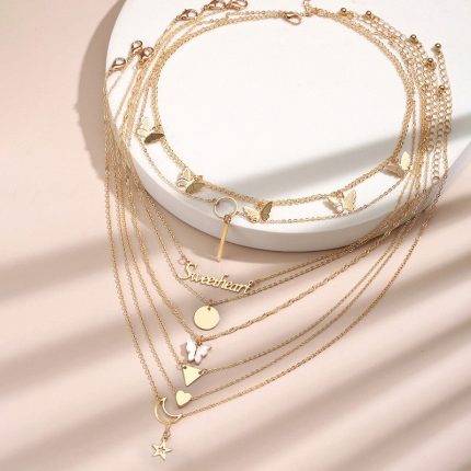 Gold-Plated Gold-Toned Pack of 8 Layered Necklace - VAIRAVI