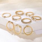 Trending Gold Plated Love inspired Set of 9 Stackable Finger Rings - VAIRAVI