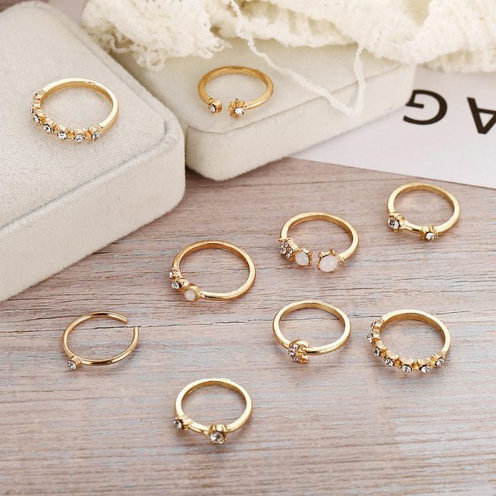 Trending Gold Plated Love inspired Set of 9 Stackable Finger Rings - VAIRAVI
