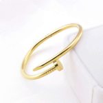 Stainless Steel Gold Plated Stainless Steel Anti Tarnish Nail Bracelet For Women - VAIRAVI