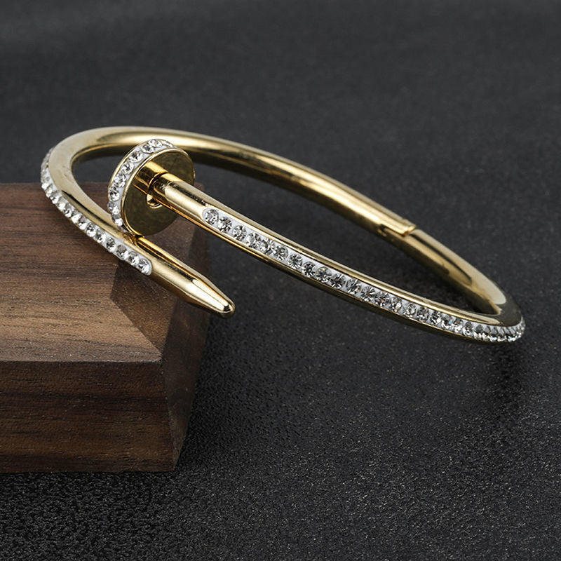 Stainless Steel Gold Plated Stainless Steel Anti Tarnish AD Studded Nail Bracelet For Women - VAIRAVI Stainless Steel Gold Plated Stainless Steel Anti Tarnish AD Studded Nail Bracelet For Women - VAIRAVI