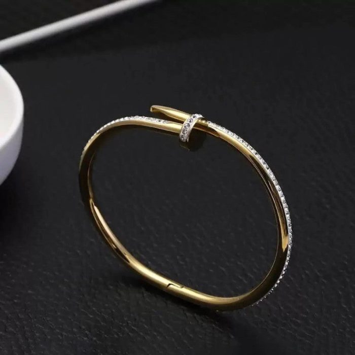 Stainless Steel Gold Plated Stainless Steel Anti Tarnish AD Studded Nail Bracelet For Women - VAIRAVI