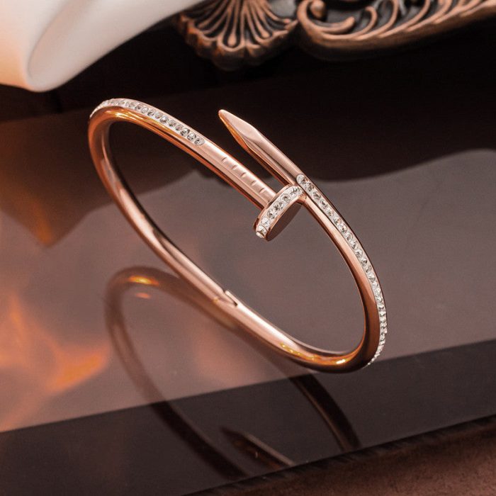 Stainless Steel Rose Gold Plated Stainless Steel AD Studded Nail Bracelet For Women - VAIRAVI