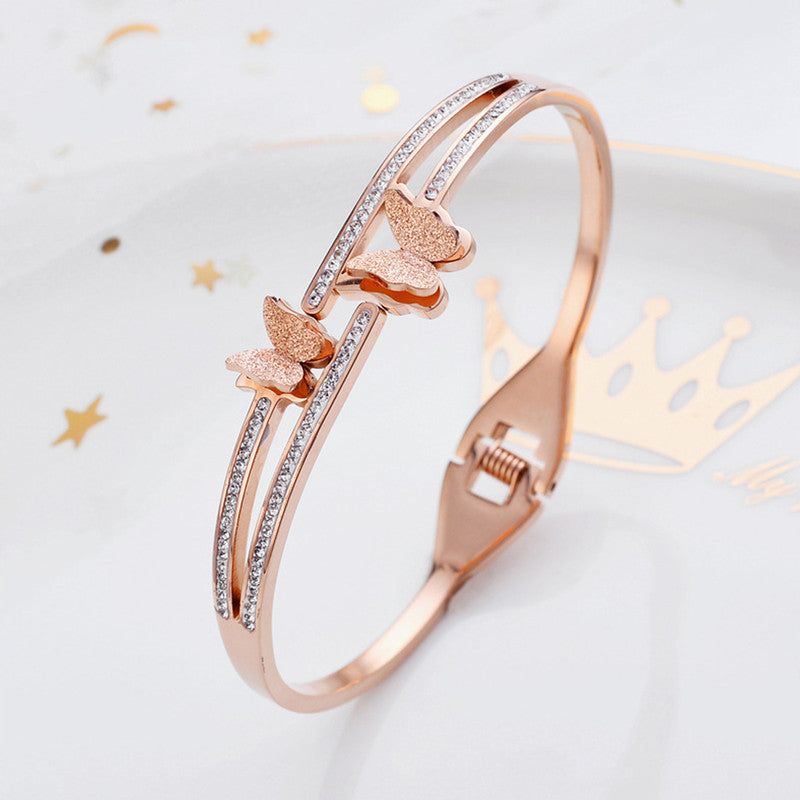 Stainless Steel Rose Gold Plated Butterfly inspired American Diamond Studded Bracelet For Women - VAIRAVI Stainless Steel Rose Gold Plated Butterfly inspired American Diamond Studded Bracelet For Women - VAIRAVI