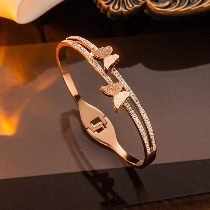 Stainless Steel Rose Gold Plated Butterfly inspired American Diamond Studded Bracelet For Women - VAIRAVI