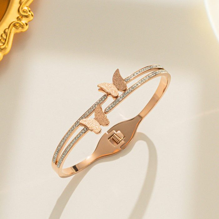 Stainless Steel Rose Gold Plated Butterfly inspired American Diamond Studded Bracelet For Women - VAIRAVI