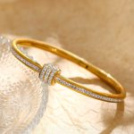 Stainless Steel Gold Plated American Diamond Studded Bangle Style Anti-Tarnish Bracelet For Women - VAIRAVI