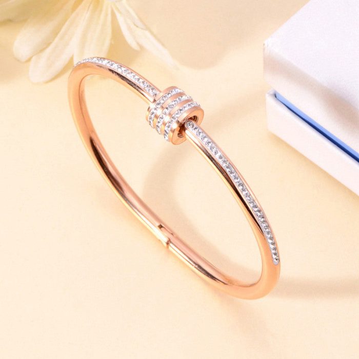 Stainless Steel Rose Gold Plated American Diamond Studded Bangle Style Bracelet For Women - VAIRAVI