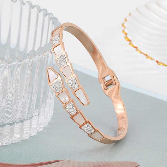 Stainless Steel Rose Gold Plated Mother of Pearl Snake Styled AD Studded Bracelet For Women - VAIRAVI