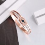 Stainless Steel Rose Gold Plated American Diamond Studded Evil Eye Bracelet For Women - VAIRAVI