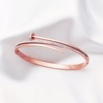 Stainless Steel Rose Gold Plated American Diamond Studded Nail Bracelet For Women - VAIRAVI