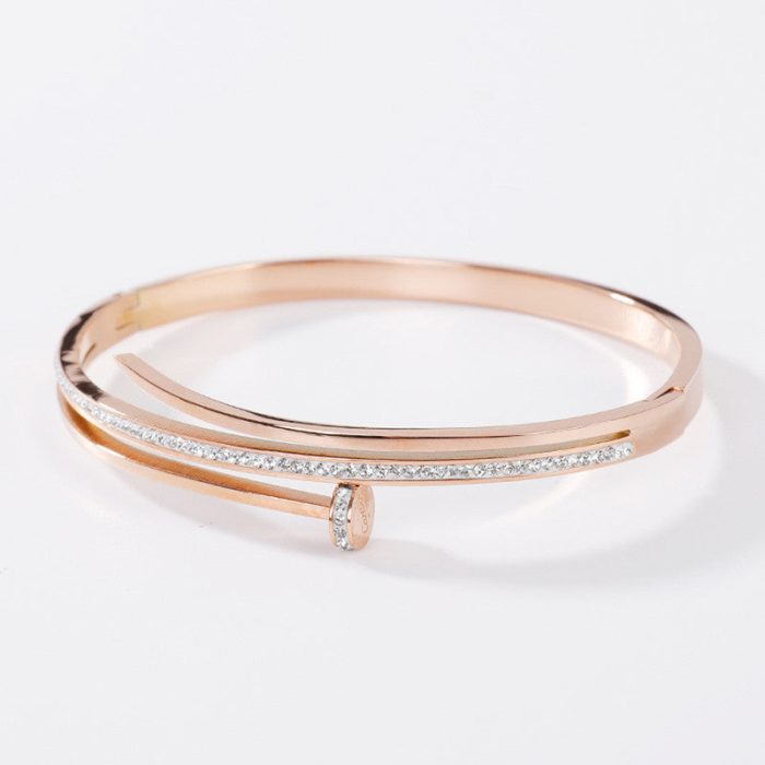 Stainless Steel Rose Gold Plated American Diamond Studded Nail Bracelet For Women - VAIRAVI