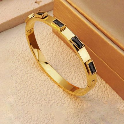 Stainless Steel Gold-Plated Black Rectangular American Diamond studded Bangle-Style Anti-Tarnish Bracelet For Women - VAIRAVI