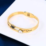 Gold Plated Stainless Steel Heart Themed Anti Tarnish Bangle Style Bracelet - Image 16