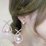 Rose Gold Plated American Diamond Studded Cross Shape Korean Stud Earrings - Image 4