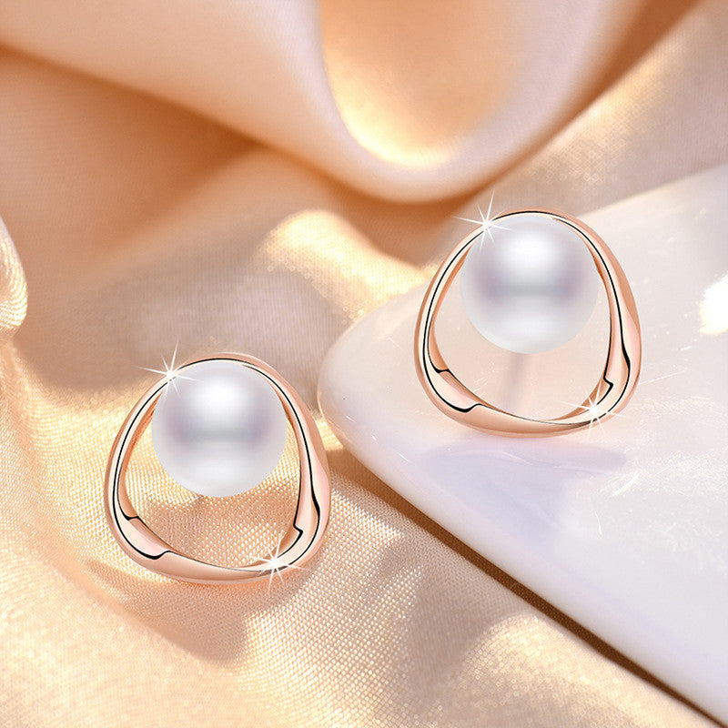 Rose Gold Plated Triangle Shaped Pearl Studded Korean Stud Earrings - Image 1
