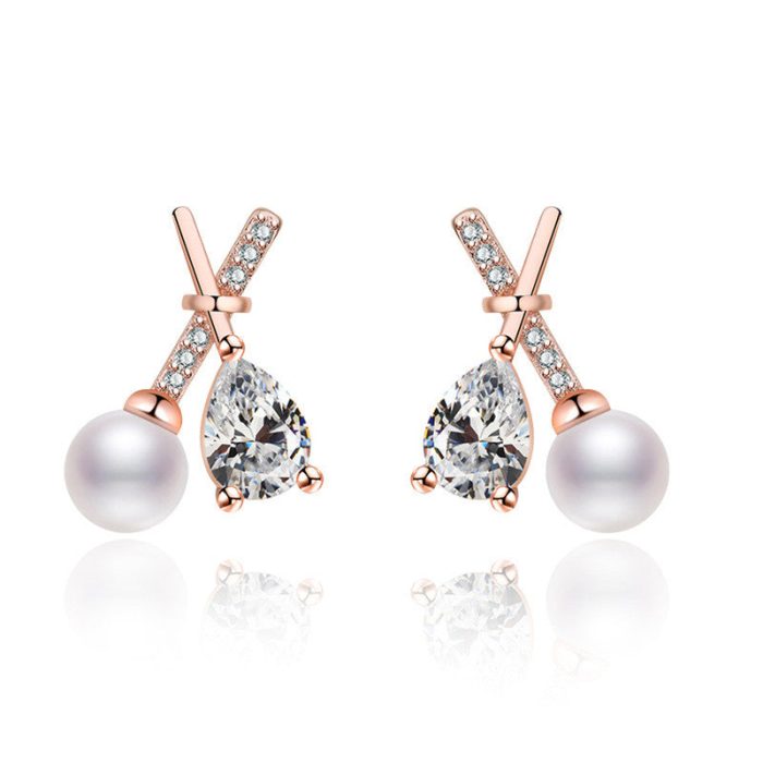 Rose Gold Plated American Diamond Studded Cross Shape Korean Stud Earrings - Image 2