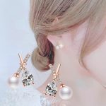 Rose Gold Plated American Diamond Studded Cross Shape Korean Stud Earrings - Image 3