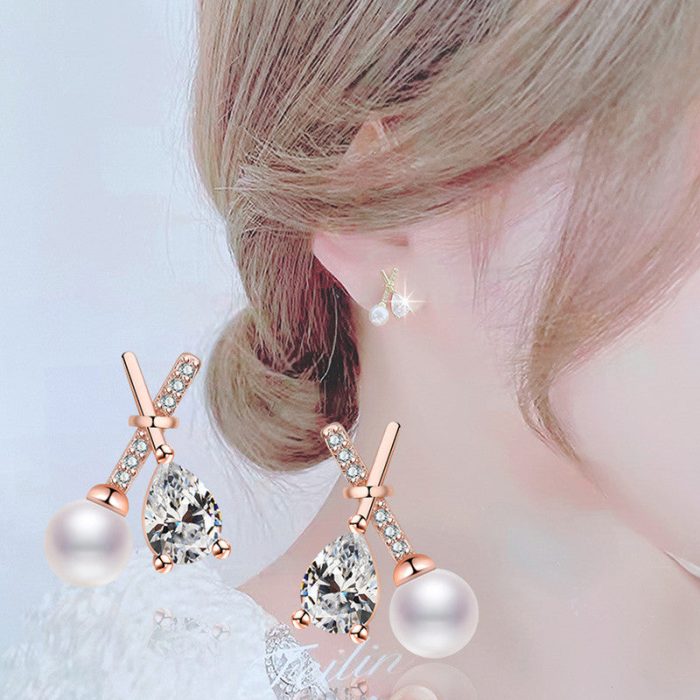 Rose Gold Plated American Diamond Studded Cross Shape Korean Stud Earrings - Image 3
