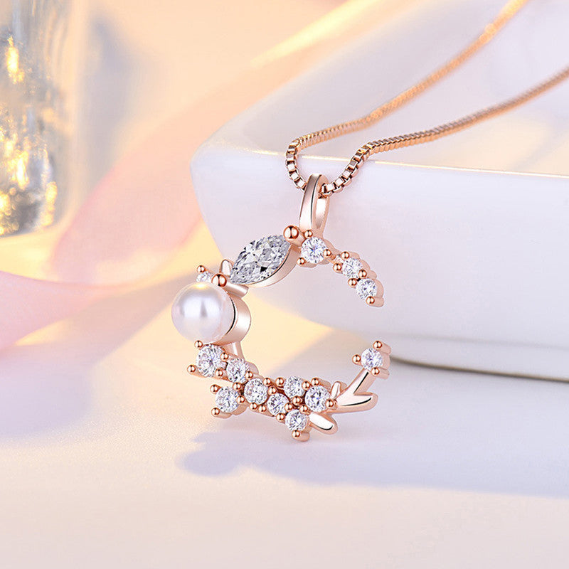 Rose Gold Plated American Diamond Studded Moon Shape Contemporary Korean Pendant - Image 1