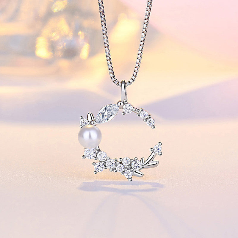 Silver Plated American Diamond Studded Moon Shape Contemporary Korean Pendant - Image 1