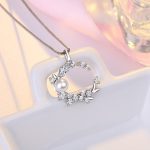 Silver Plated American Diamond Studded Moon Shape Contemporary Korean Pendant - Image 2